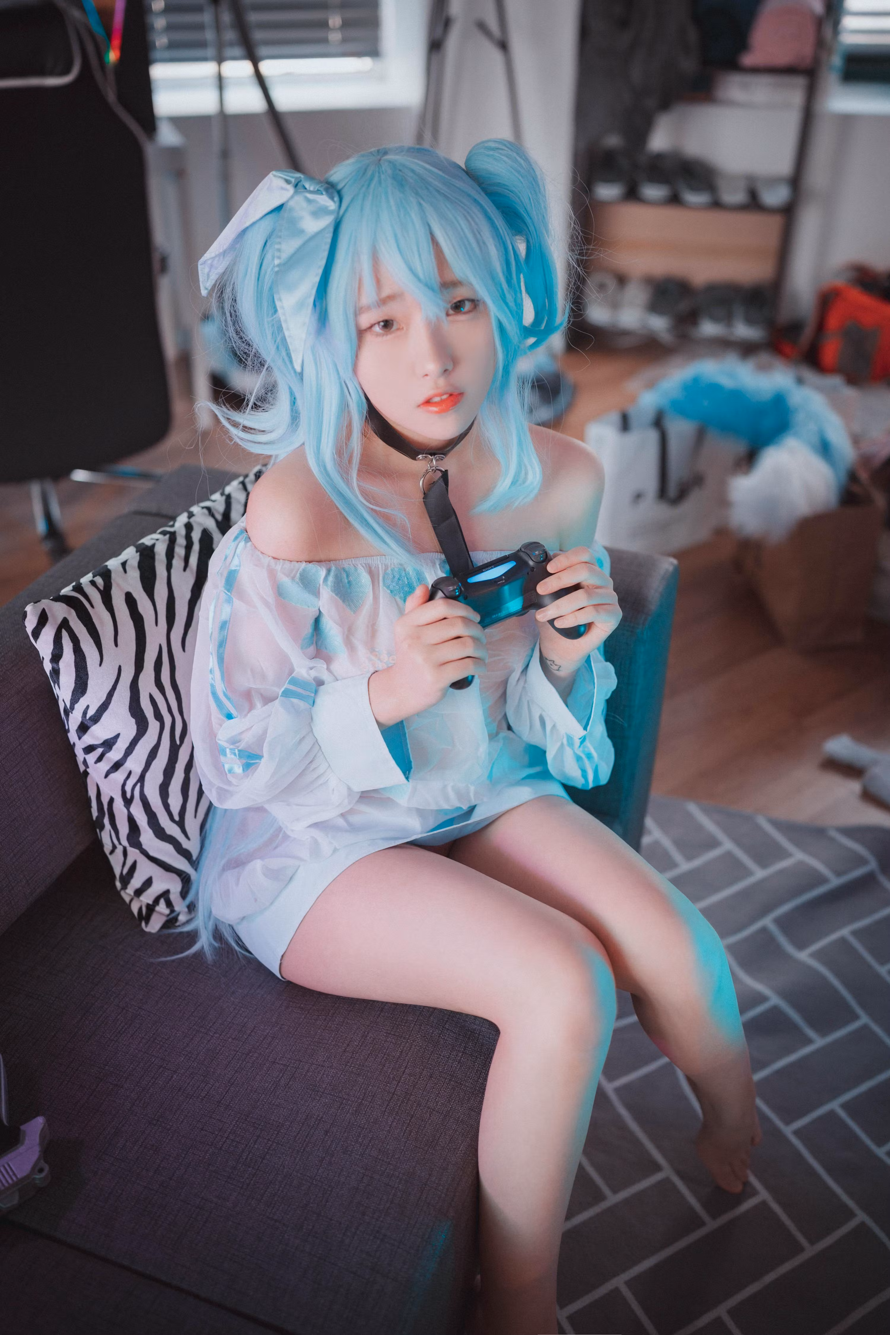 Sonson posing in detailed game costume studio