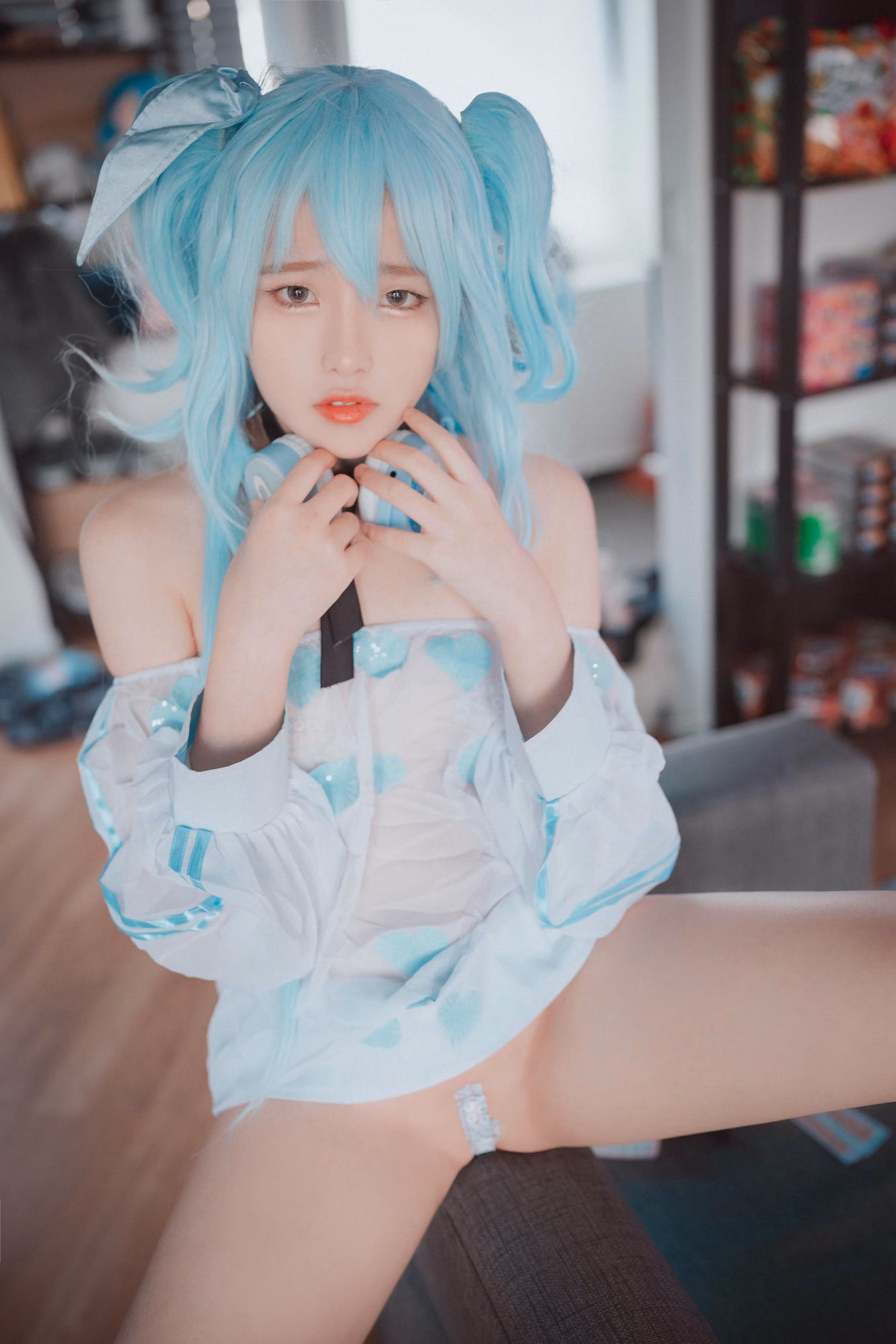 Sonson posing in detailed game costume studio